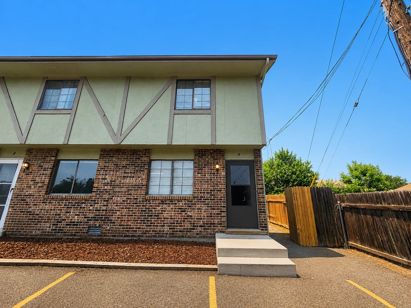 Freshly Updated 2 Bed / 1 Bath Townhome with Yard Access Now Leasing! — Photo 1