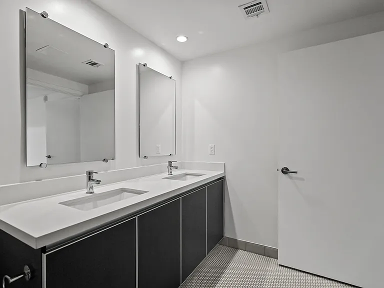 Bathroom with Double-Sink Vanity with Cabinet Storage