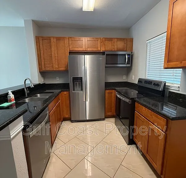 8555 Bernwood Cove Loop #103 — Photo 6