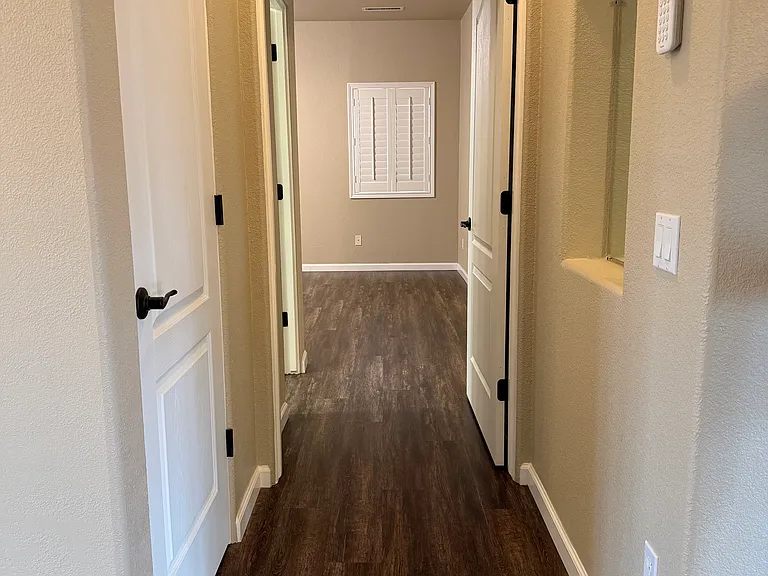 Hallway to primary suite
