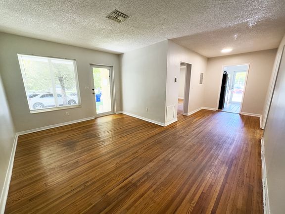 corner view of living room and dinning room