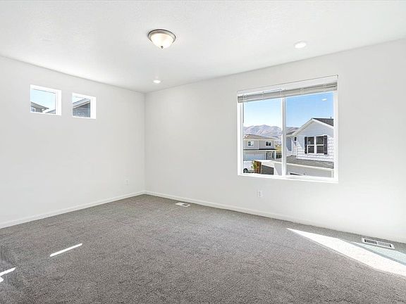 a view of the bedroom and windows
