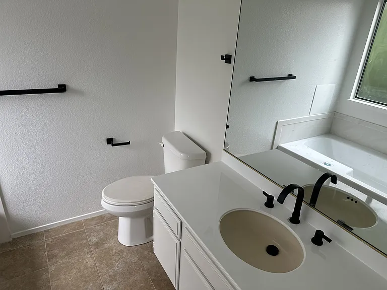 Primary Bedroom His & Hers Bathroom 2 of 2