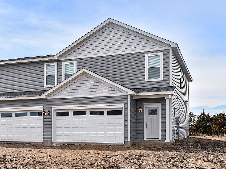 The Howard is a beautiful two story home with siding.