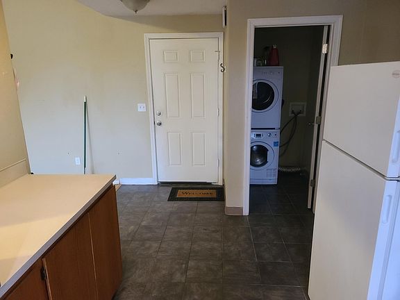 Front door entrance, Part of Kitchen and washer/dryer utility room