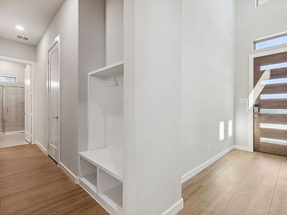 Entry in the Picasso II home plan by Trophy Signature Homes - REPRESENTATIVE PHOTO