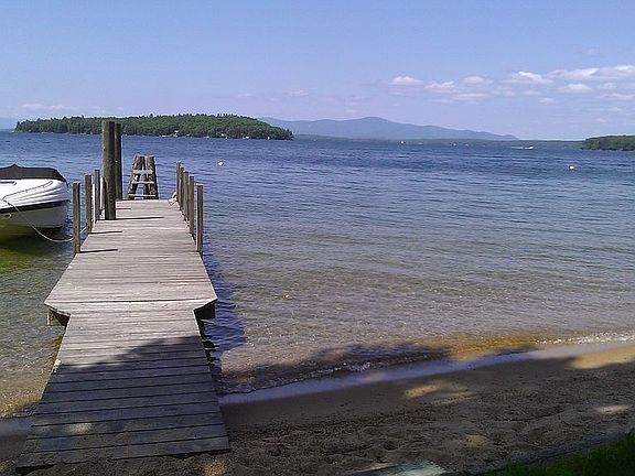 50' dock and wide fine sand beach