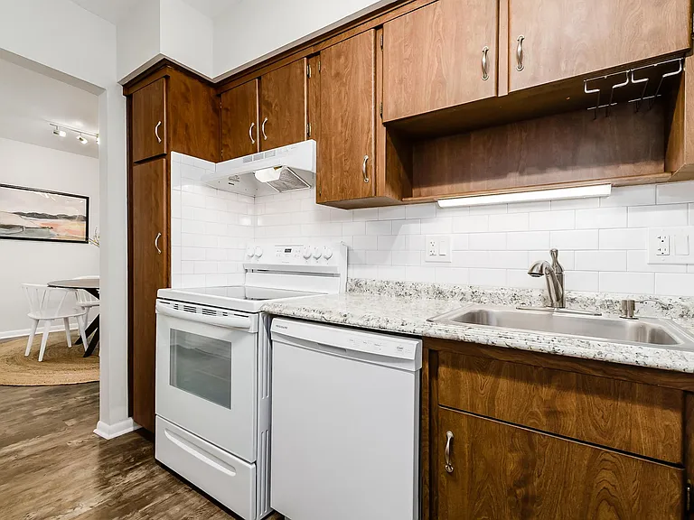 kitchen with new countertop and subway tile backsplash