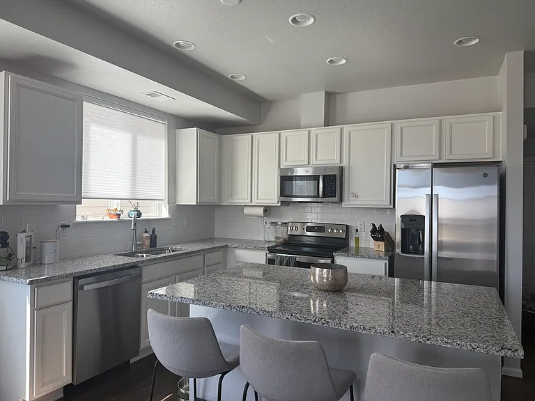 6551 N Dunkirk St — Photo 3