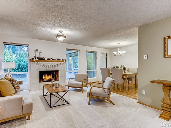 Living and dining rooms as seen from the front entryway.