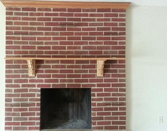 WOOD BURNING FIREPLACE WITH CUSTOM GLASS SHELVES