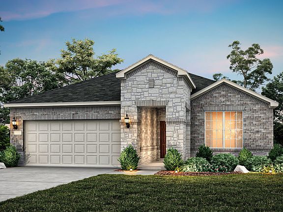 The Emory, a one-story home with 2-car garage, shown with Home Exterior 34