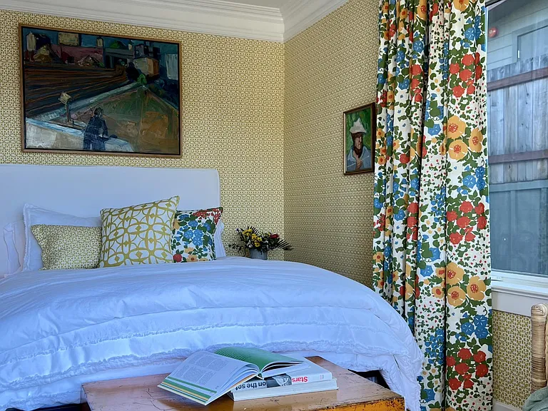 'Yellow Bedroom' - Queen size bed tucks in to this hall bedroom. Bedroom has sliding patio doors to view-facing deck. Closet outfitted with wire mesh drawers, hanging rod and shelf.