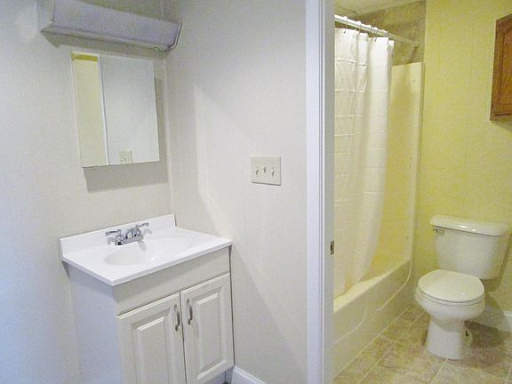 Updated bath (sink is outside the bathroom)