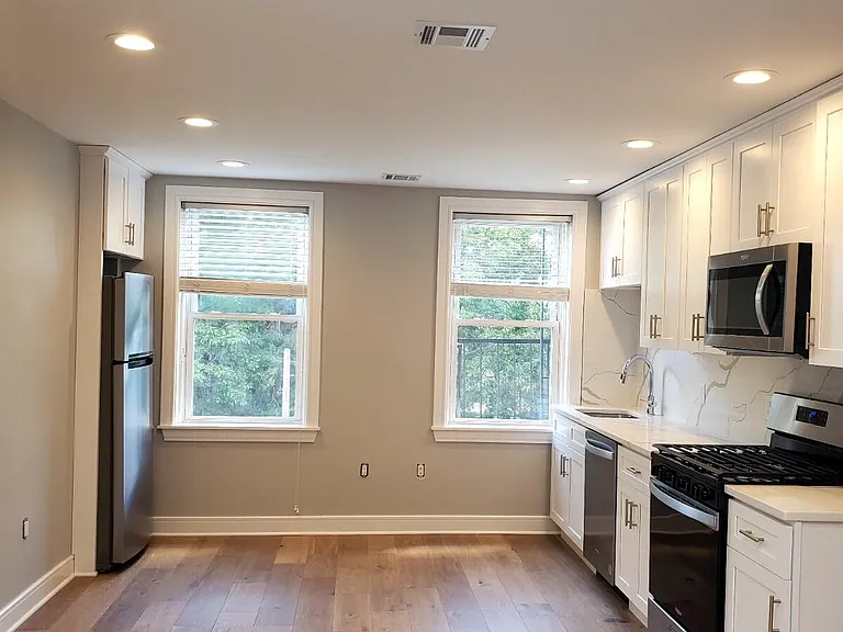 Open Kitchen with stainless steel appliances