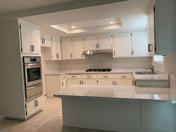 Kitchen with New Appliances & Recessed Lighting.