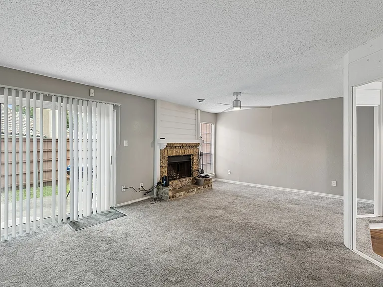 Spacious Living Room with Fireplace