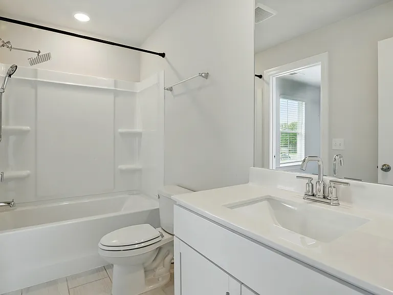 Guest Bathroom - Shared full bathroom with dual access from bedrooms 2 and 3_convenient and private.