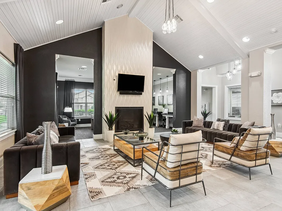 Modern Clubhouse with TVs, Kitchen & Coffee Bar at Katy Ranch Apartments in Katy, TX