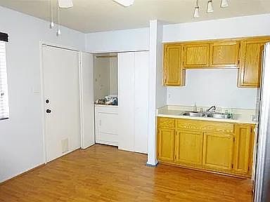 Kitchen/dining/laundry closet.