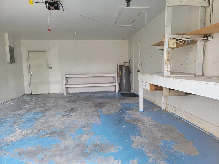 One-Car Garage with workbench, space for storage