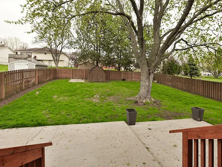 Back of Home, Fully Fenced, Patio Area with Planters and Shed
