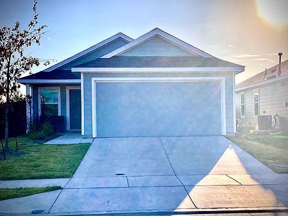 Ample parking for your family and guests. Or the 2 Car garage can be used for extra storage.