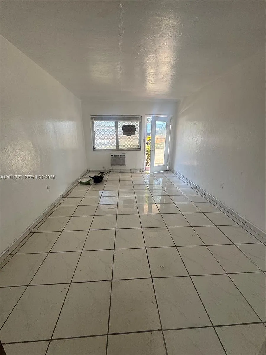 Building Photo - 7300 Harding Ave #9