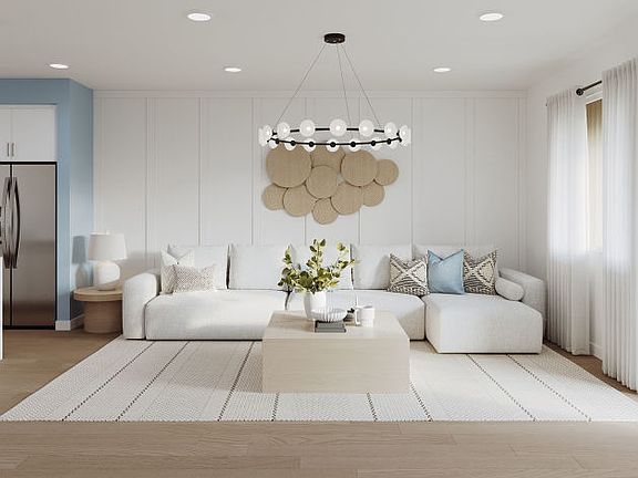 Gathering room with sliding glass door and balcony access