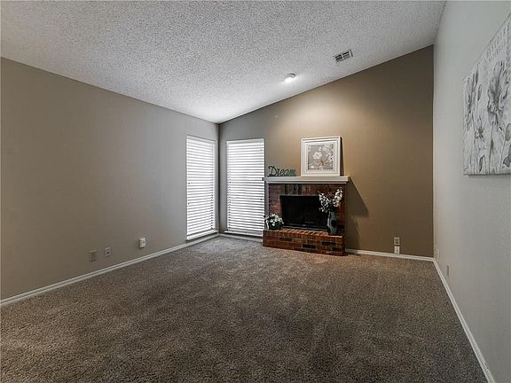 Catherdral ceilings in this spacious living room.