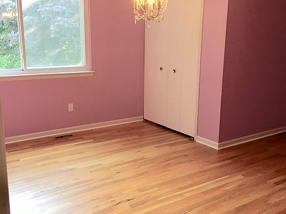 Bedroom with walk-in closet