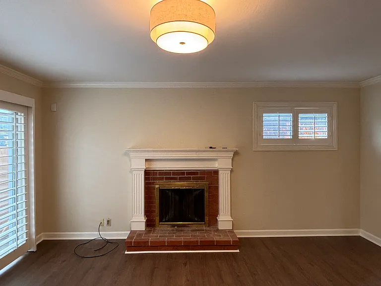 Wood burning fireplace in living room
