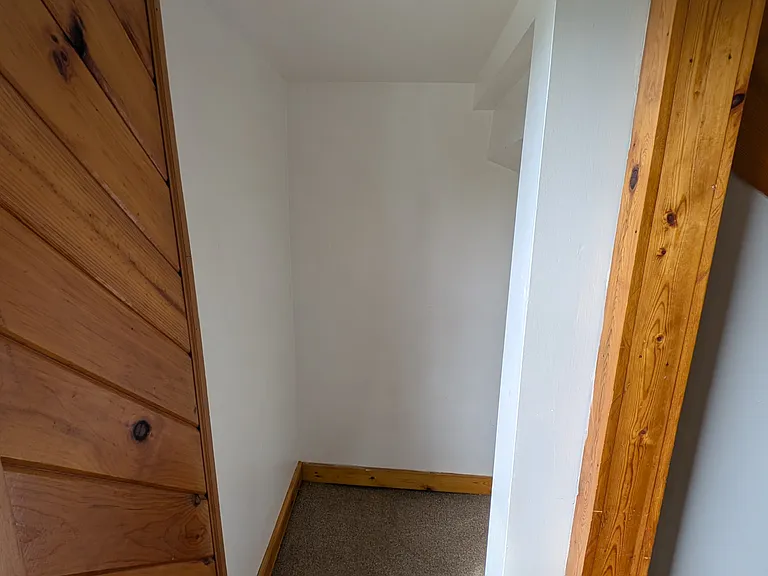 Vestibule for storage under stairs to 2nd floor