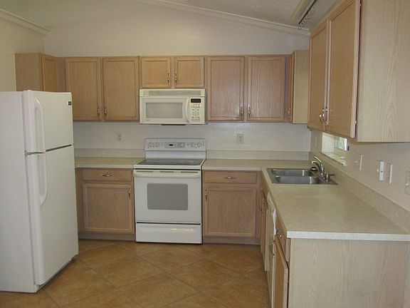 5th image of 2884 SE Melaleuca Blvd