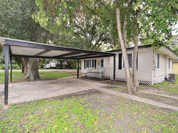 Large Front Driveway and Carport
