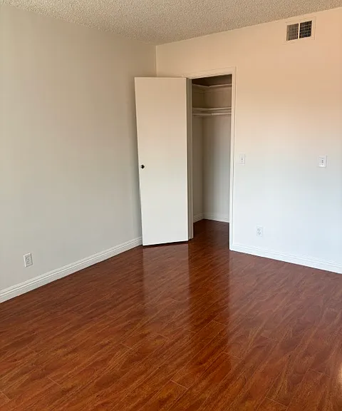 Bedroom 1 w/walk in closet