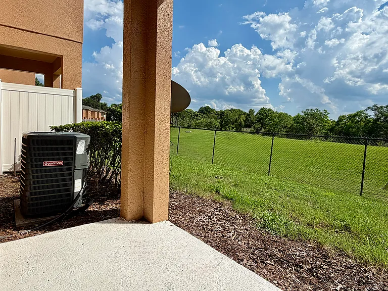 Relaxing views. Covered back patio view -1720 RETREAT VIEW CIR.