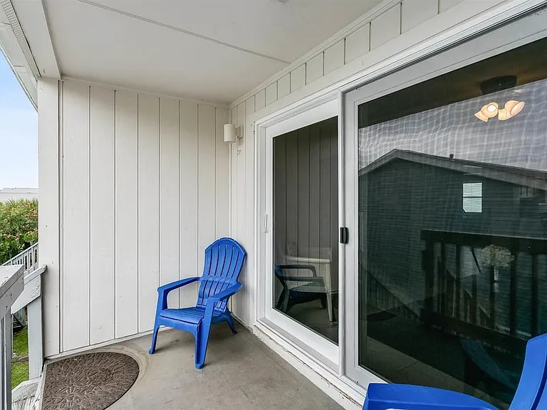 Balcony steps to community pool and beach