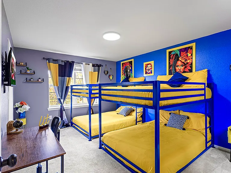 Fun and playful bunk bed room with colorful decor, perfect for kids and sleepovers.