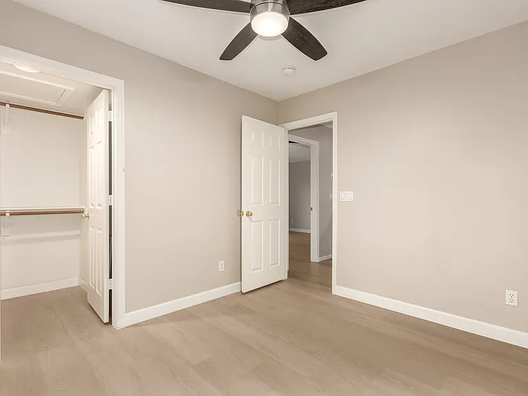 Bedroom 4 with Cul-de-Sac & Community Tree Views.