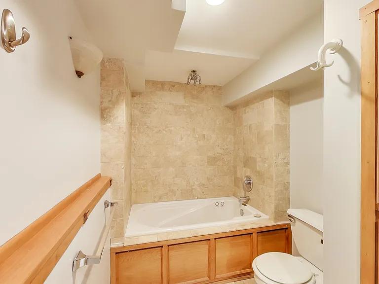 Bathroom 2- All woods have been painted white.