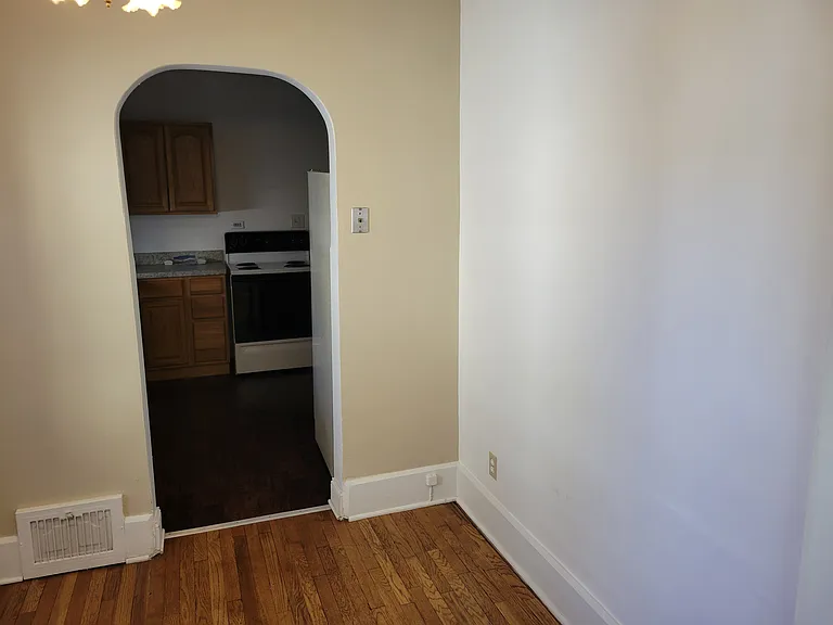 Breakfast nook leading to kitchen.