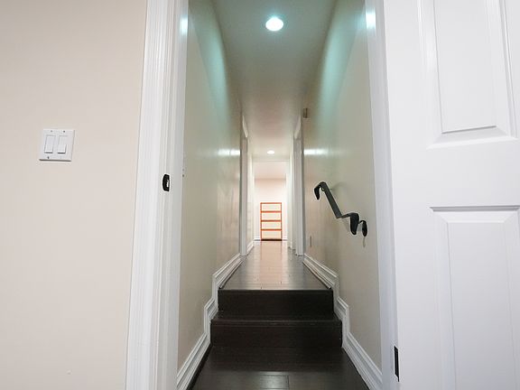 Hallway leading to the bedroom and kitchen & dining room