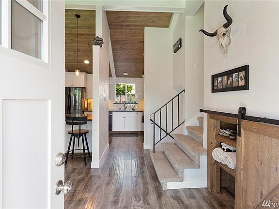 Come on in to this stunning remodeled home, be sure to check out the shoe closet!