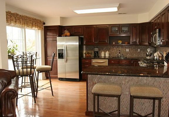Gorgeous gourmet kitchen w/ sliders to patio                                  