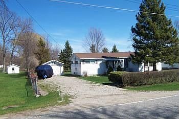 Sandy beach access at the end of Larned Rd.  Nice location, country setting yet close to town.  Neat & clean with much updating done to home some of the updating include breaker box, windows, roof, disposal, plumbing fixtures and more.