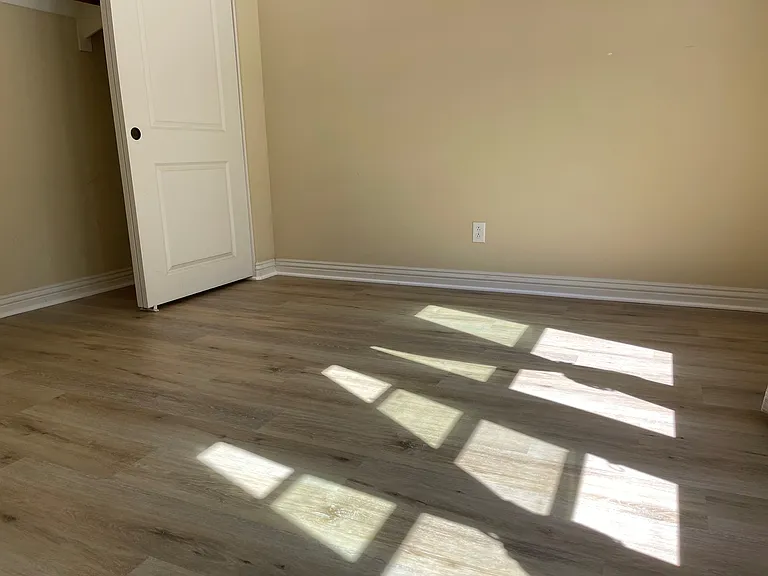 Bedroom at first floor with Luxury Vinyl Flooring