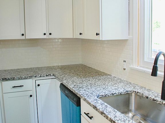 Granite Counters and Brand New Kitchen Cabinets and Appliances