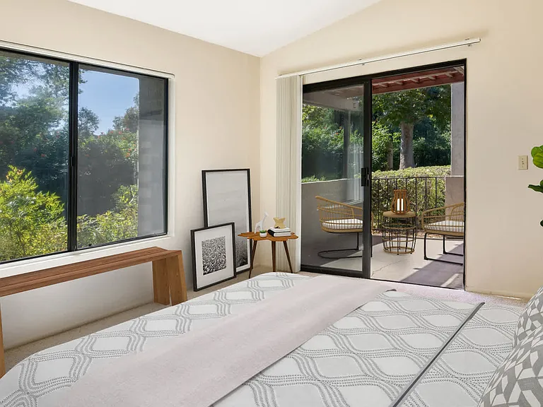 Carpeted Living Room with Patio