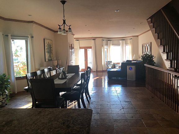 Dining room featuring Italian flooring.